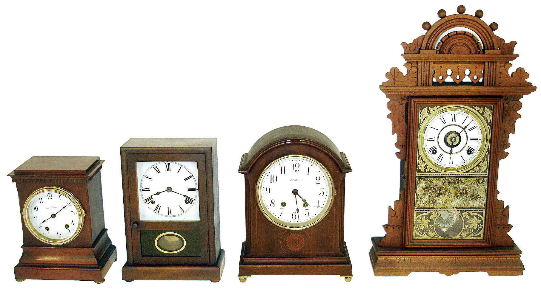 Clocks- 4 (Four) Seth Thomas, Thomaston, CT, shelf. (1) "Turin" model cabinet clock, 8 days, hour & half hour strike, c1913 (2) "Tory" model 8 day hour strike cabinet clock, c1913. (3) Cottage clock, 8 day hour & half hour strike, mahogany with painted dial, c1910. (4) "Eclipse" special order "premium" walnut parlor clock, 8 day hour & half hour strike & alarm, c1890. — Antique Clocks Price Guide