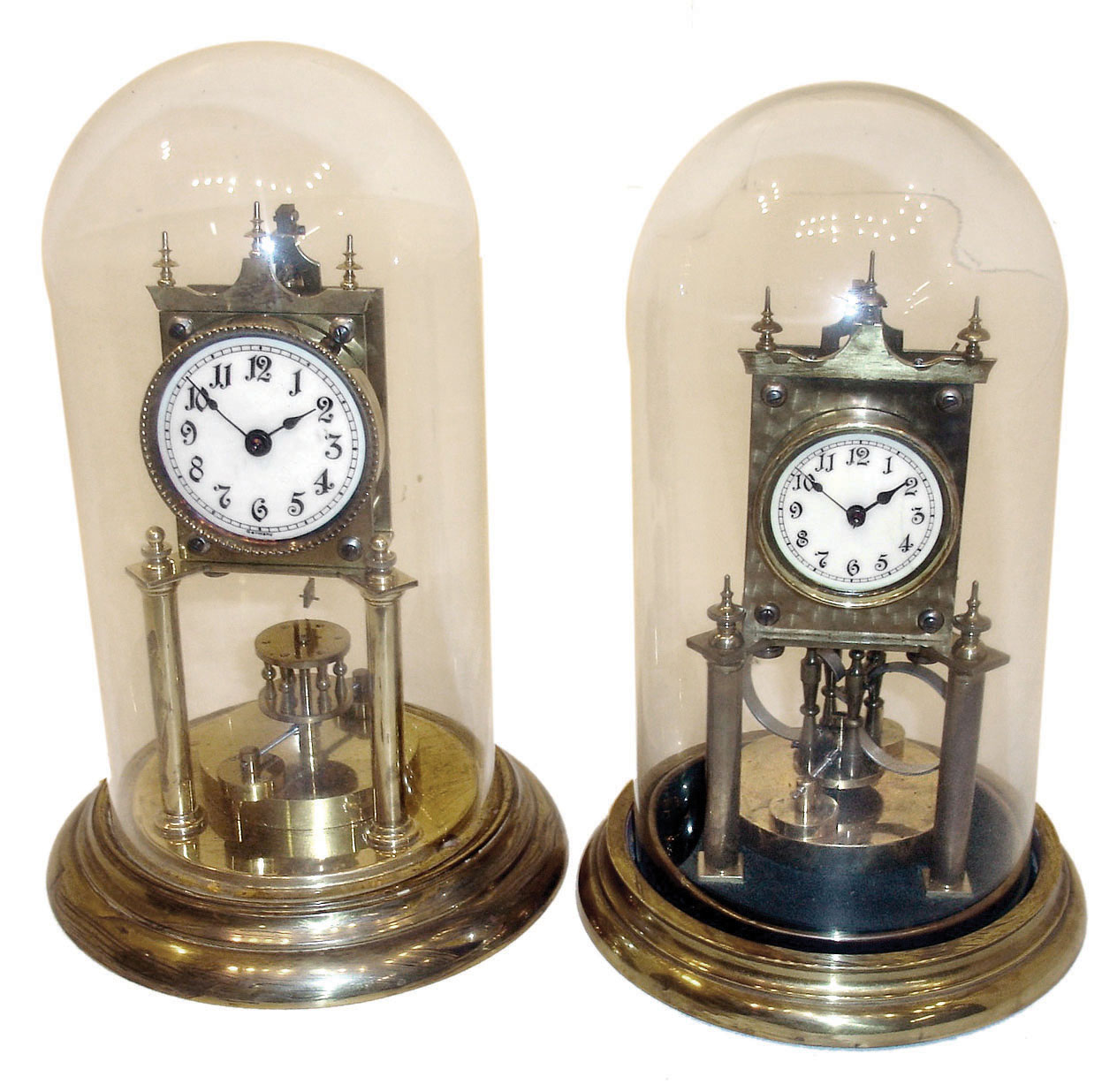 Clocks- 2 (Two) German made 400 day disk pendulum unsigned "anniversary" with glass domes, one with compensating pendulum, c1910 — Antique Clocks Price Guide