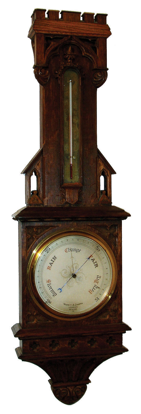 Negretti and Zambra, London, aneroid barometer and thermometer, the ornate carved oak case in the Gothic style, thermometer with silvered scale, barometer with engraved, silvered dial with blued steel indicator and gilt set hand, and signed Negretti & Zambra, London, No. 4190, c1900 — Antique Clocks Price Guide