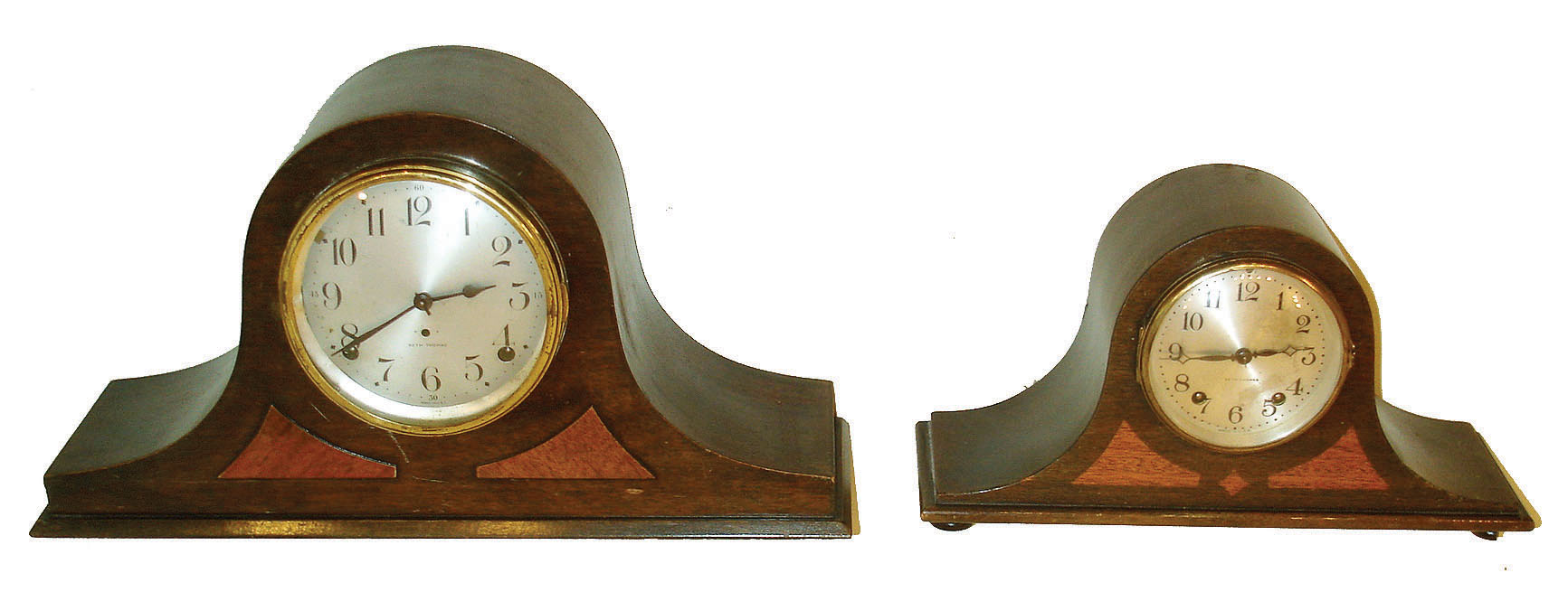Clocks- 2 (Two) Seth Thomas Clock Co., Thomaston, Conn., tambours: (1)"Tambour 3", 8 days, time and strike on single gong, c1928. (2)8 days, time and strike, on two rods. — Antique Clocks Price Guide