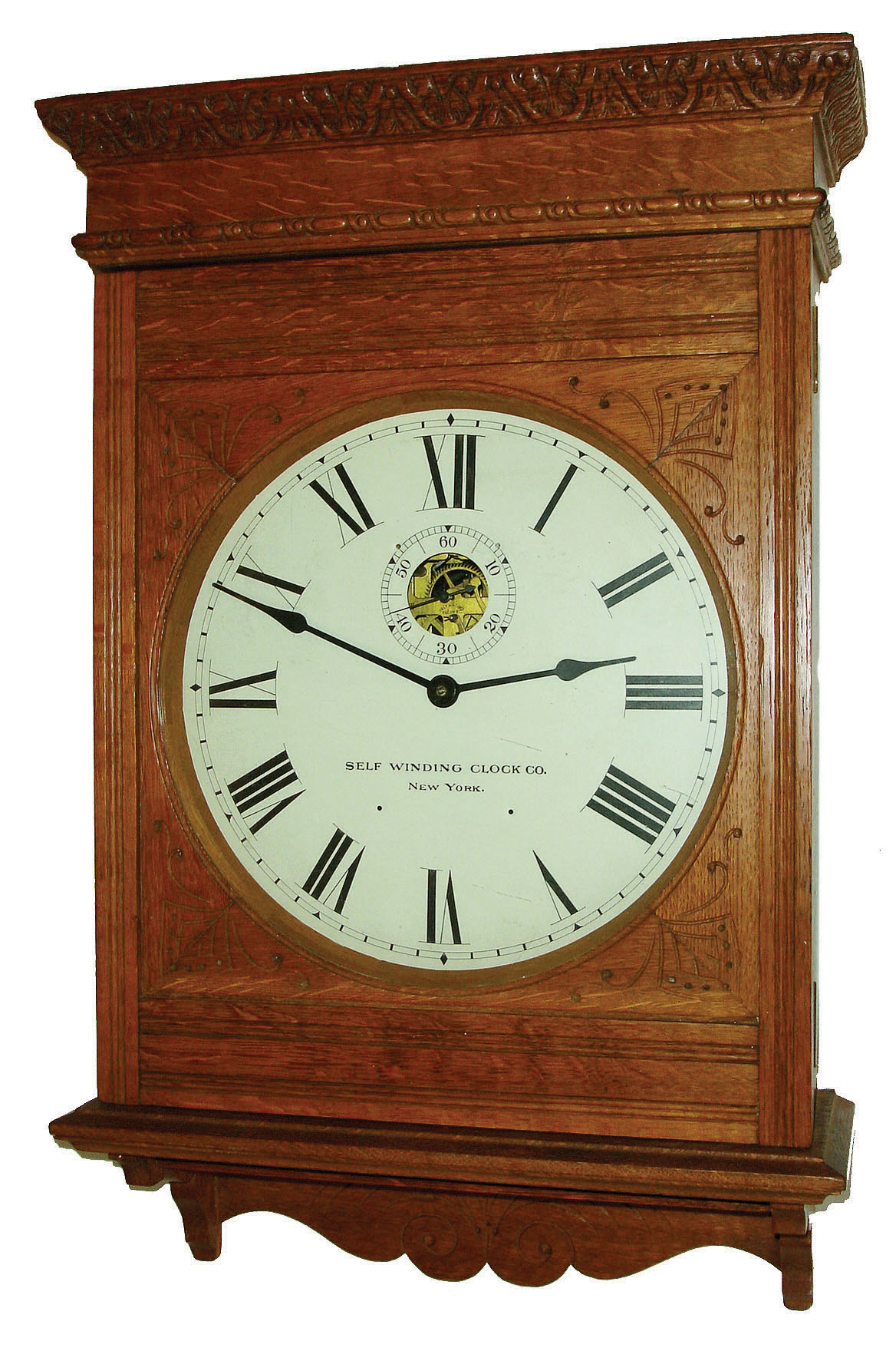 Self Winding Clock Co., New York, Model No. 10 oak wall clock, movement serial number 102996, c1908 — Antique Clocks Price Guide