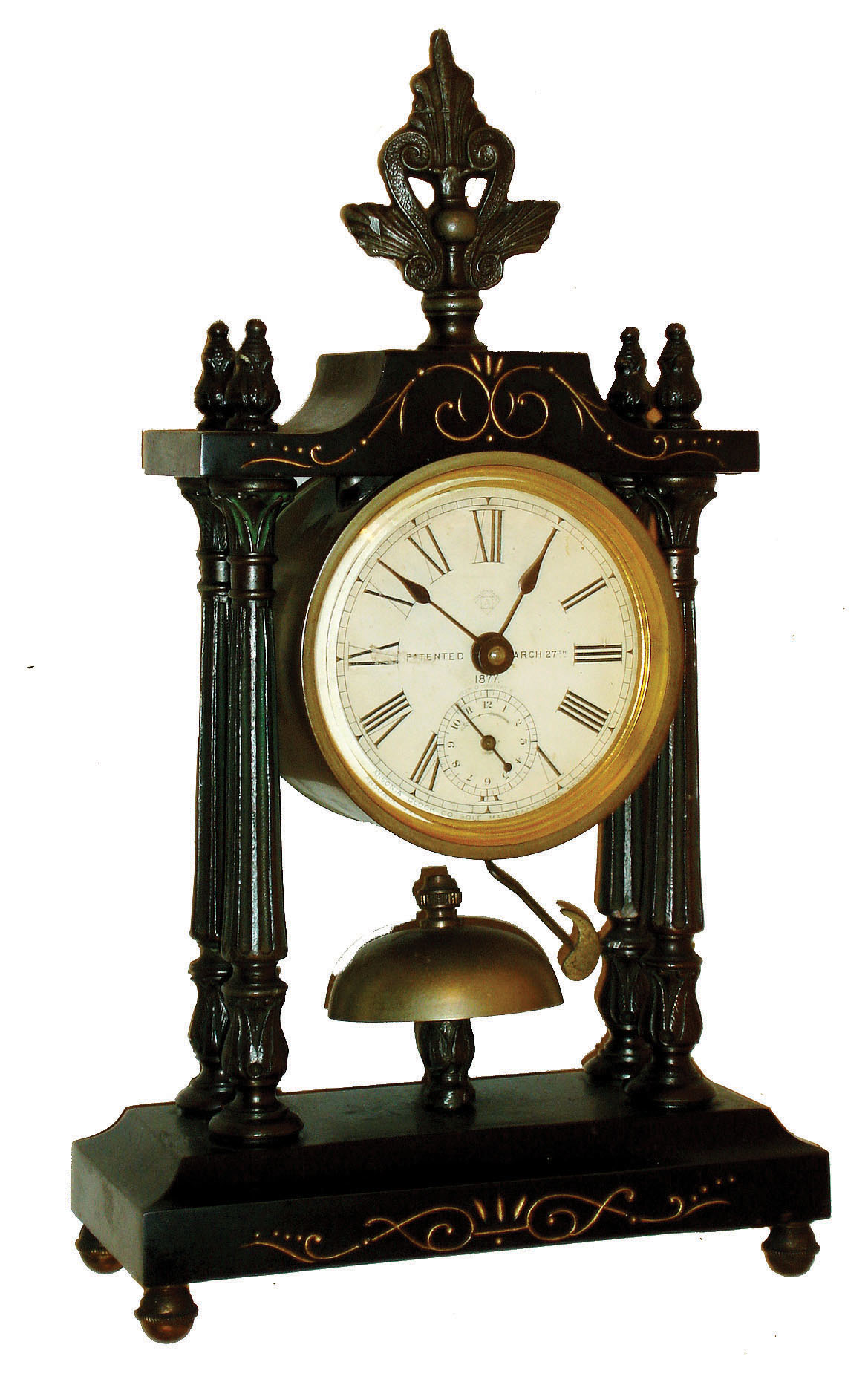 Clocks- 2 (Two): Ansonia Clock Co., New York, N.Y.: "Little Dorrit" 30 hour time and alarm black enameled metal novelty clock, c1886 and a vase clock with balance wheel movement — Antique Clocks Price Guide