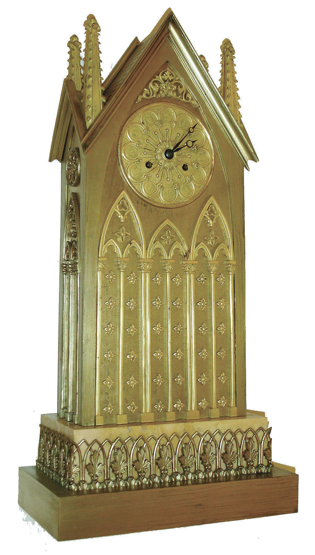 France, cathedral form mantel clock in the Gothic style, gilt bronze case with gabled facade, the 4 corners with crocket decorated pinnacles, the front and sides with ornamental lancet arches, atop a siena marble and gilt bronze base, the marble with lancet arch and foliate fence surround, Roman numeral gilt Gothic dial with blued steel Breguet style hands, 8 days, time and strike, pendule a Paris movement with silk thread suspension, c1840 — Antique Clocks Price Guide