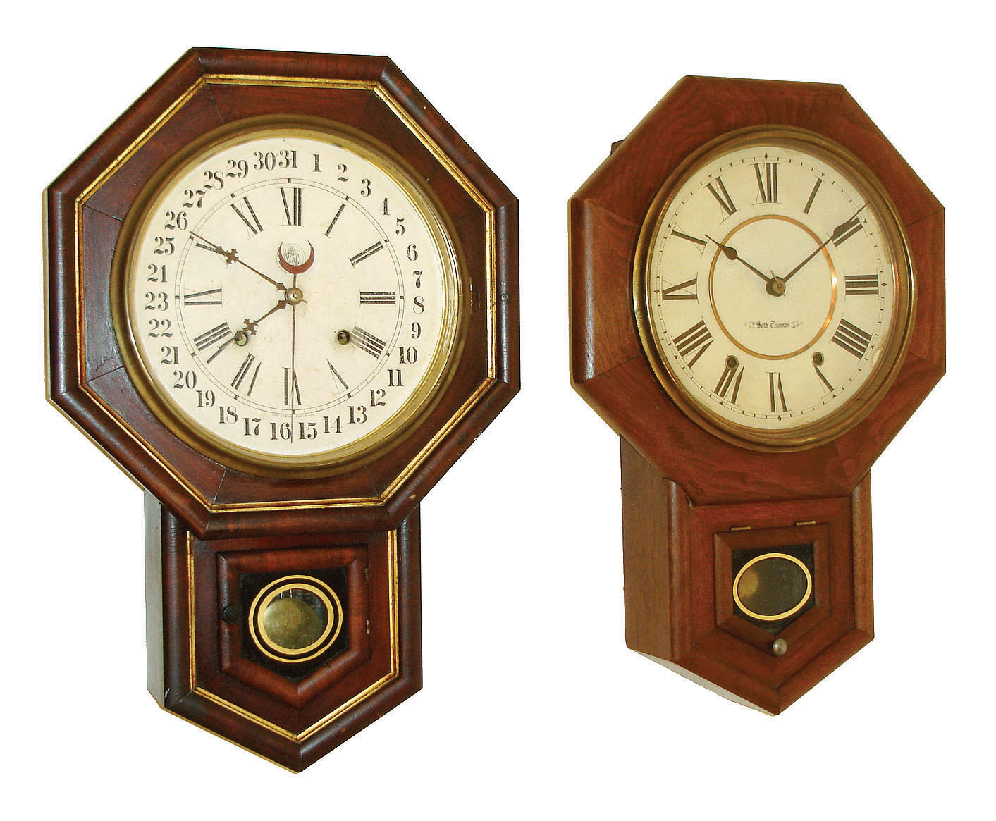 Clocks- 2 (Two) Connecticut wall: (1) Seth Thomas Clock Co., Thomaston, "10 Inch Drop Octagon" 8 days, time and strike,,; c1900. (2) Waterbury Clock Co., Waterbury, "10 Inch Drop Octagon" 8 day time, strike & calendar clock, c1900. — Antique Clocks Price Guide