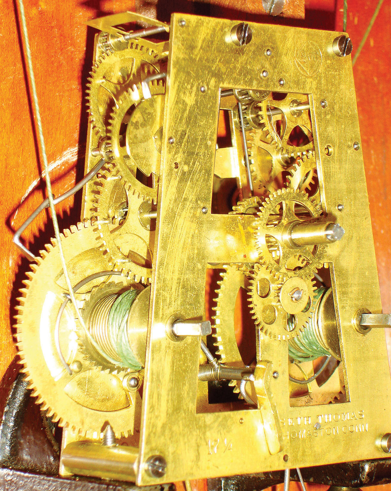 Seth Thomas Clock Co., Thomaston, Conn., "Flora" 8 days, time and strike, hanging wall clock in cherry case, c1886. — Antique Clocks Price Guide