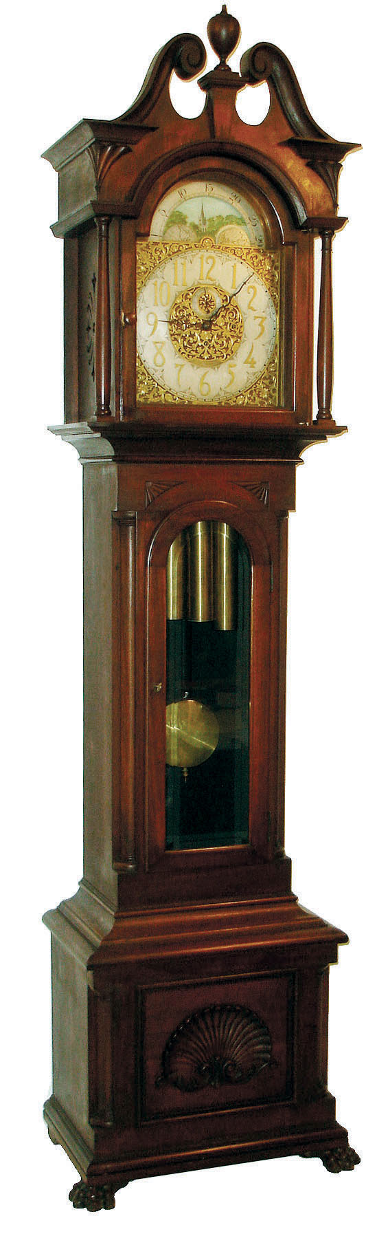 Seth Thomas Clock Co., Thomaston, Conn., tall clock, 8 days, weight driven time & quarter chiming on four bells and striking on cathedral gong, case with beveled door glass and turned full columns on hood. Brass dial with applied cast brass spandrels and engraved center, silvered chapter with applied brass numerals and moon phase, c1900 — Antique Clocks Price Guide