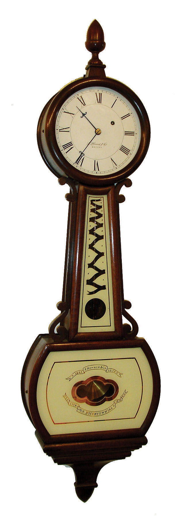 E. Howard & Co., Boston, Mass., "Bicentennial Banjo", wall clock, 8 days, time only, weight driven movement in a mahogany case with reverse painted throat and lower tablets with 13 colonies motif and painted metal dial, serial #109, dated 1977 — Antique Clocks Price Guide