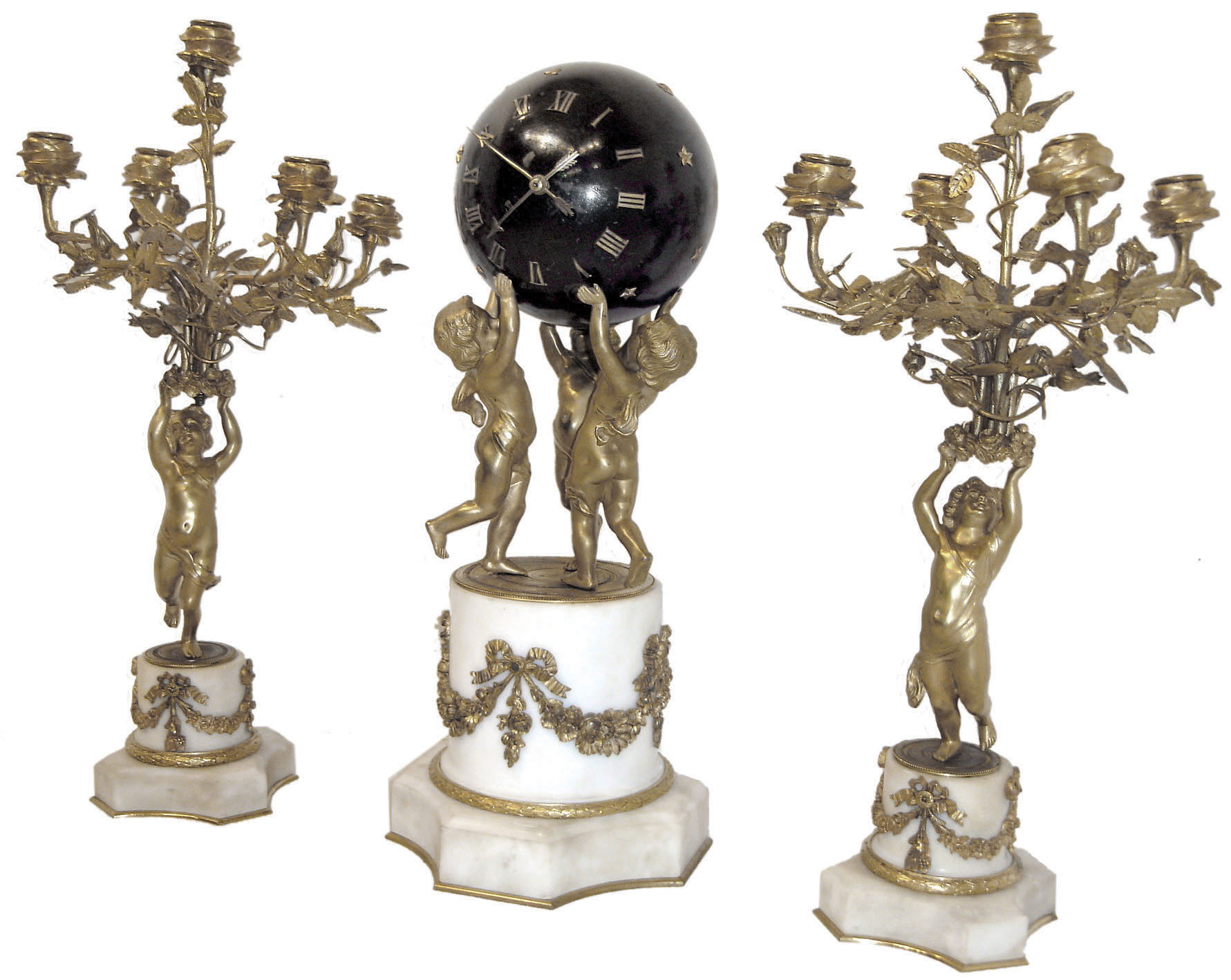 France, 3-piece mantel set, "3-Cherubs" supporting a star studded ball containing the movement, time indicated by "arrow" hands, all 3 with bases of white marble, and ormolu swag accents, and each candle stand with rose cups for 5 candles, and with cylinder platform, bell strike movement intact, C.1880 — Antique Clocks Price Guide
