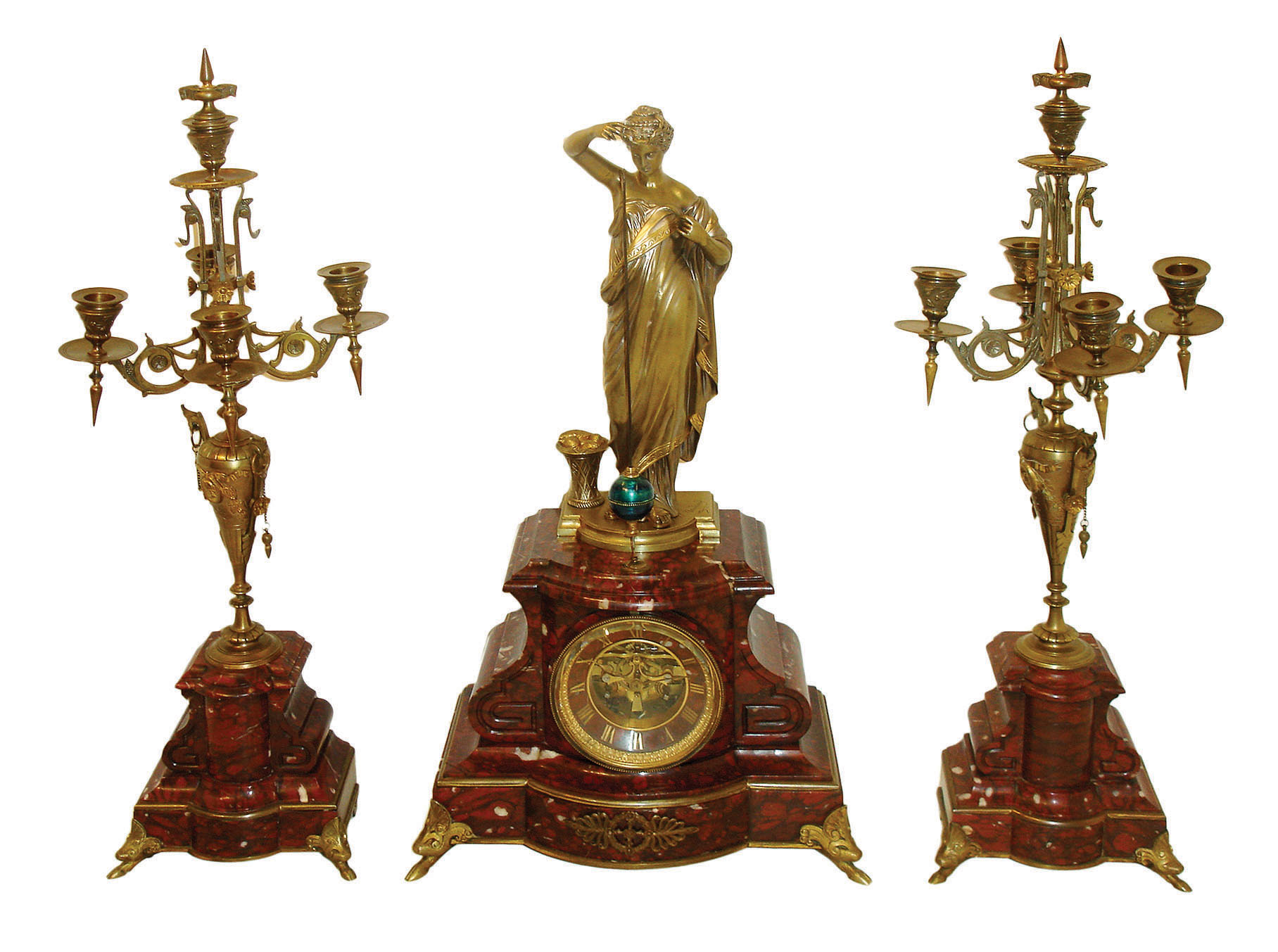 France, Bernoux, quality 3-piece "Conical Pendulum" clock set, the case of dark red mottled marble with bronze statue, case feet and yarn basket, and with matching candelabra with bronze arms and accents, c1880 — Antique Clocks Price Guide