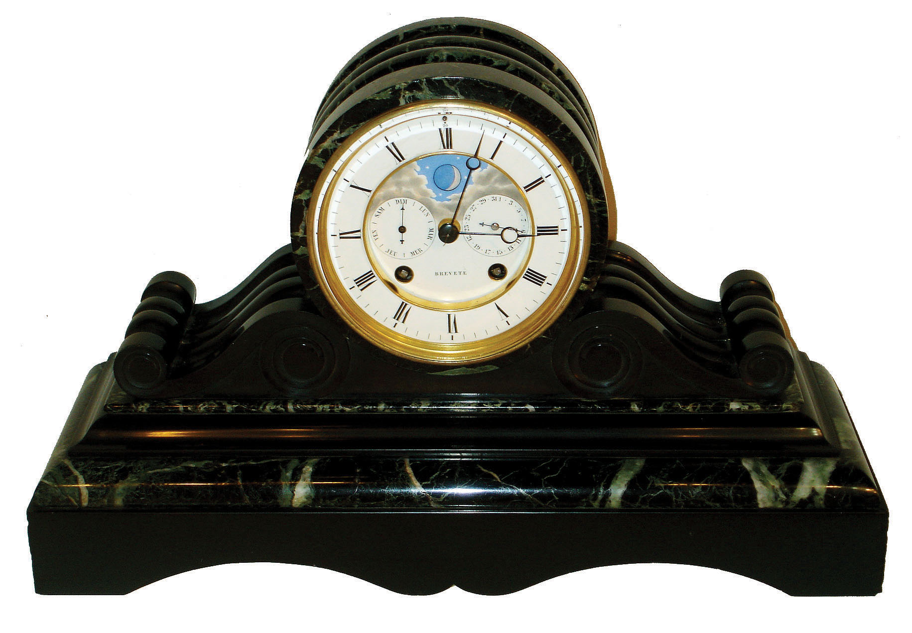 France, Delettrez and Brocot, large 3 dimensional marble tambour clock with perpetual calendar and moon phase on the dial, the black slate accented with moldings of green- grey and black variegated marble. With a robust and oversize movement carrying the calendar mechanism between the front plate and the dial, rather than with a separate mechanism & dial, as we commonly see, c1860 — Antique Clocks Price Guide