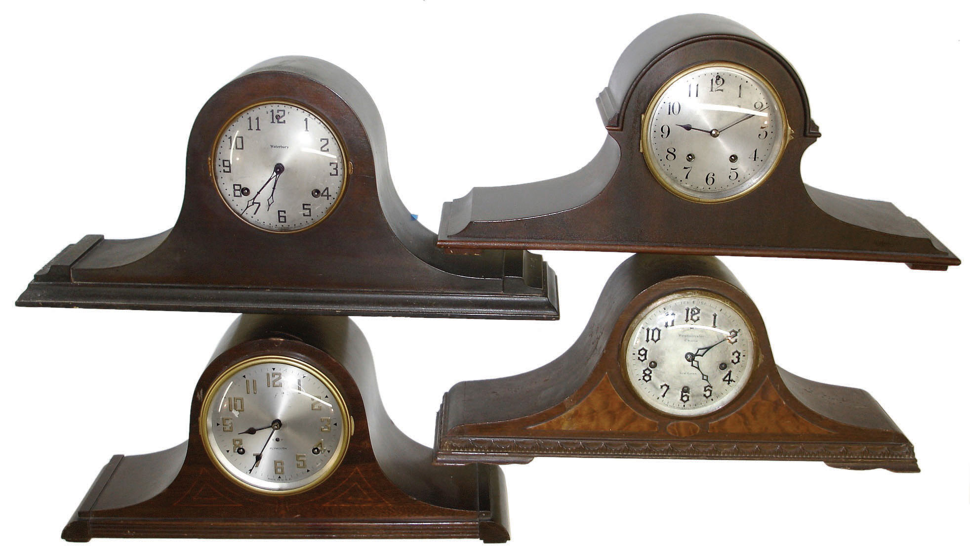 Clocks- 7 (Seven) Tambour 8 day wooden mantel: New Haven 3-train; two Plymouth 2-trains; Bulova German 3-train; Seth Thomas 2-train round movement; Waterbury 2-train; Seth Thomas 2-train; 20th century — Antique Clocks Price Guide
