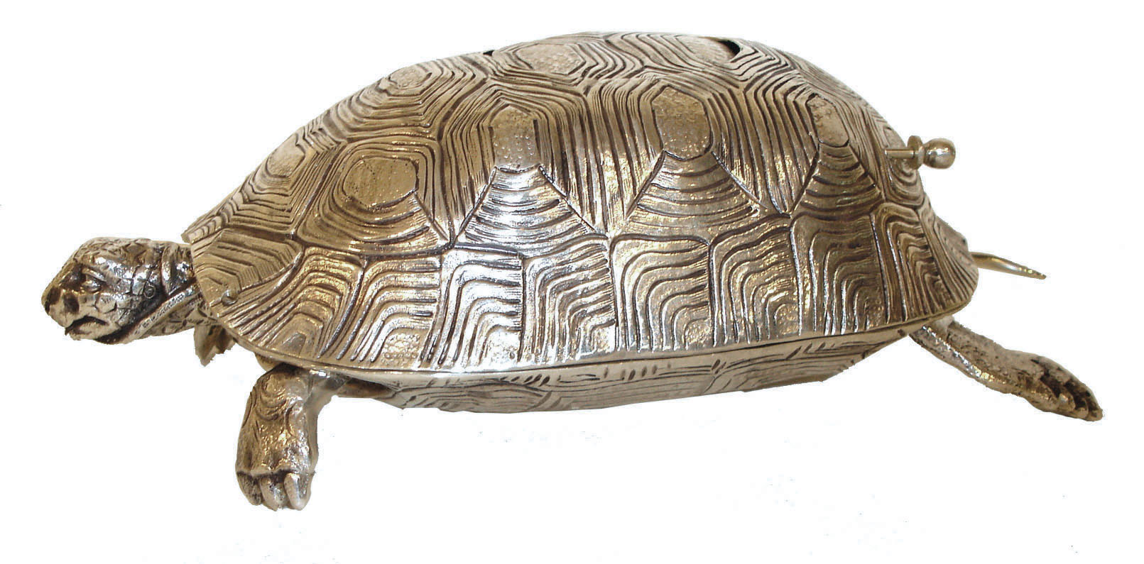 Germany, singing bird box in the form of a sterling silver turtle, the action triggered by a pull slide at the rear, the turtle with pivoted head and slight back and forth movement while the bird performs, 7 1/4" L, 20th century — Antique Clocks Price Guide