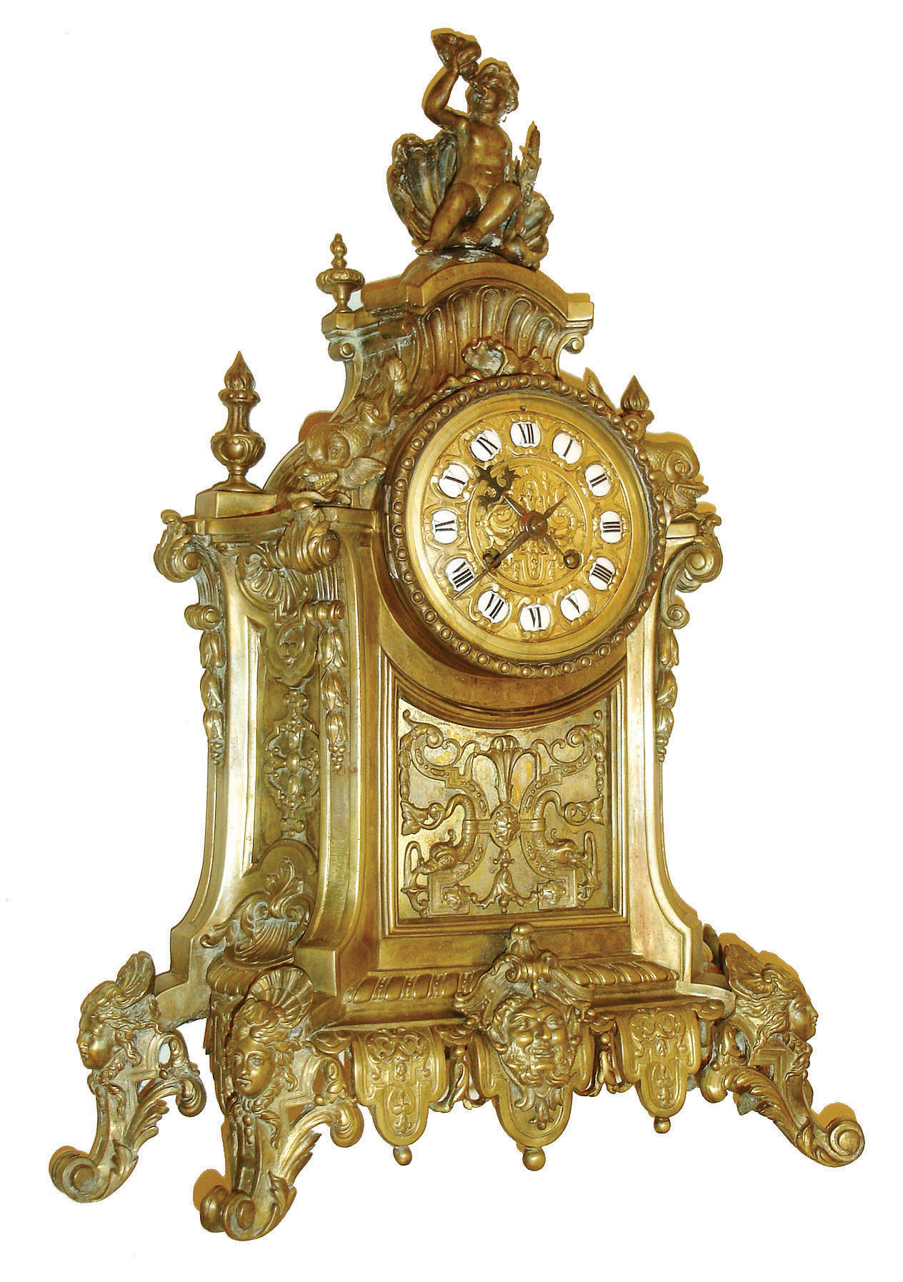 France, ornate cast brass mantel clock, the case with marine ornamentation including dolphins, scallop and other shells, the top with a putto seated in a large scallop shell and blowing a conch horn, the base with scallop, female mask and acanthus ornamented French scroll feet, with central mask of Neptune, gilt dial with applied Roman numeral cartouches, blued steel hands, 8 days, time and strike, pendule a Paris movement signed Japy Freres, and also Popon a Paris, c1880 — Antique Clocks Price Guide