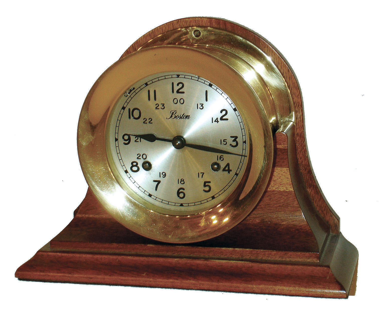 Boston, by Chelsea, brass 8 day time & ship's bell strike marine clock, with screw bezel on mahogany cradle, German 132-071 movement dated 1978, — Antique Clocks Price Guide