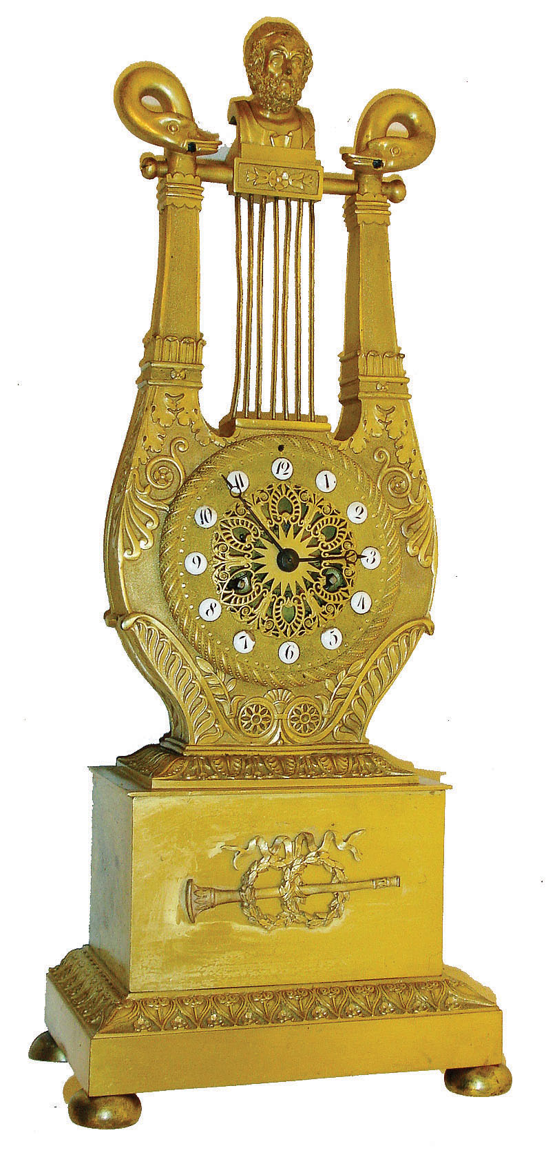 France, 8 days, time and strike, Lyre form shelf clock with pendule a Paris movement with silk suspension, gilt bronze case ornamented in the Grecian style, the base with long horn, wreaths and bowknot, top of lyre with swans heads and central bust, gilt skeletonized dial with anthemion decoration and set with round enamel Arabic numeral cartouches, blued steel Breguet style hands, c1830 — Antique Clocks Price Guide