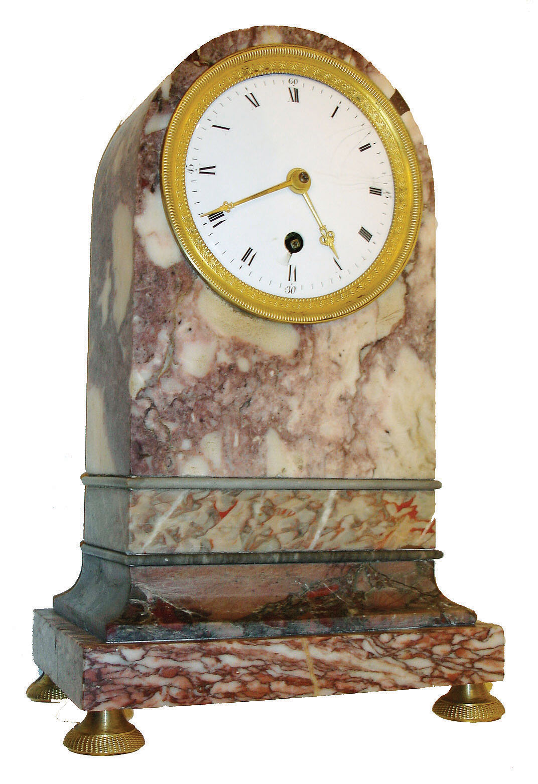 France, 8 days,marble mantel or table timepiece with pendule a Paris timepiece movement with silk thread suspension, the variegated stone case with round top, cavetto molded base and resting on gilt feet, Roman numeral white enamel dial, gilt bezel and hands, c1815 — Antique Clocks Price Guide