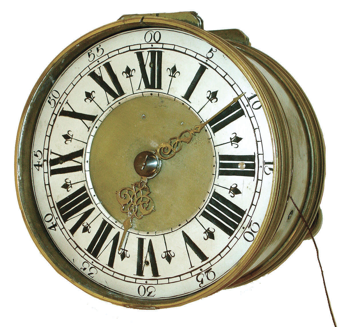 Germany, table clock, cylindrical brass case with molded top and base, and resting on three turned feet, brass 30 hours, time and strike, fusee movement with verge escapement, striking the hours and repeating on demand, the balance cock with symmetrical piercing and with engraved birds heads, Roman numeral silvered dial with Arabic outer five minute markers, pierced, gilt brass hands, c1760 — Antique Clocks Price Guide