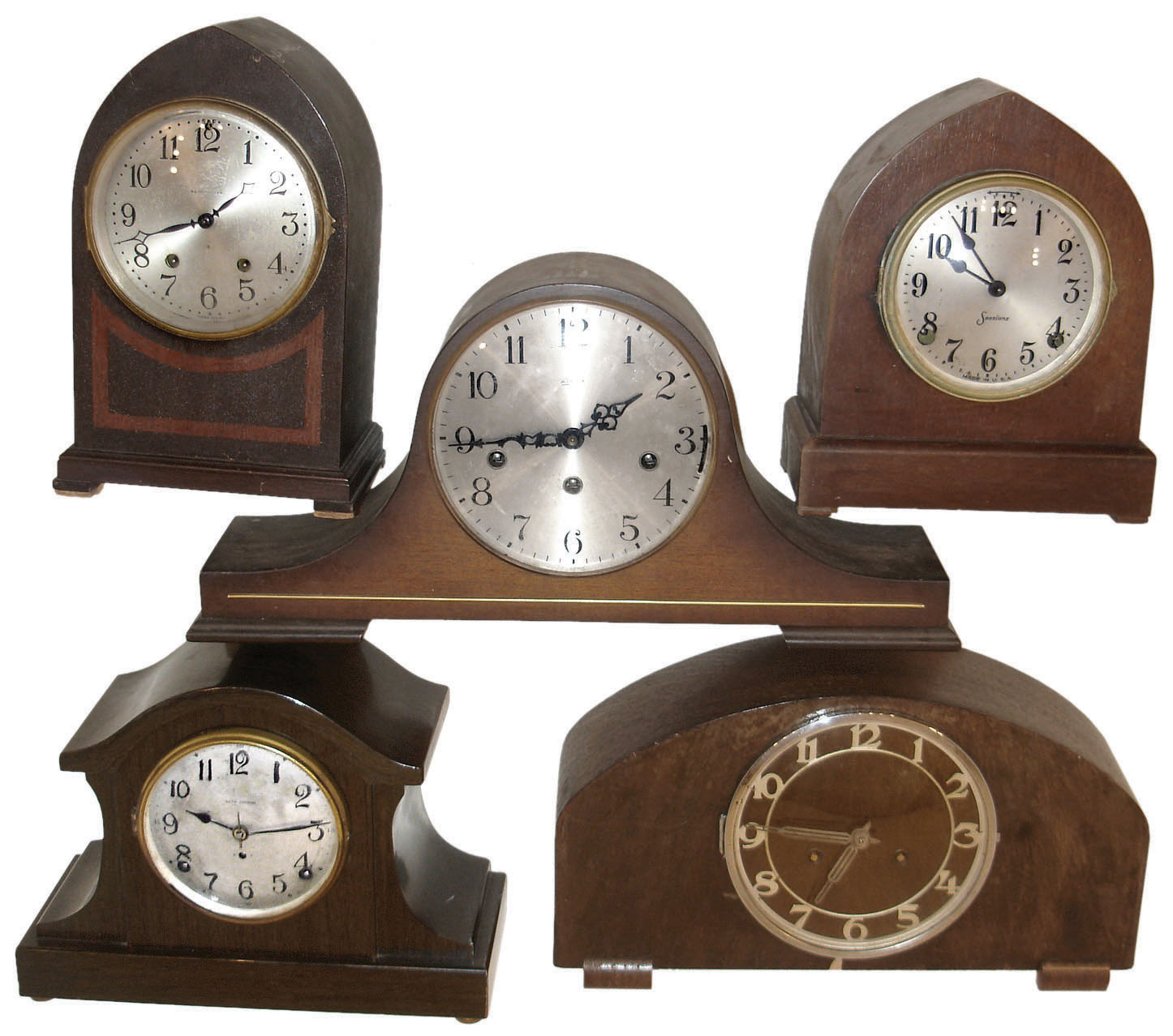 Clocks- 8 (Eight) wood 8 days, time and strike, mantel clocks: Sessions "Amherst", c1921; Linden with triple chime; two Seth Thomas "Regal" models with Adamantine case, c1921 German round top, c1930; Gilbert tambour, c1920; Seth Thomas "Wye" model with two-tone chime, c1924, Seth Thomas unidentified model tambour, c1920; all 20th century — Antique Clocks Price Guide