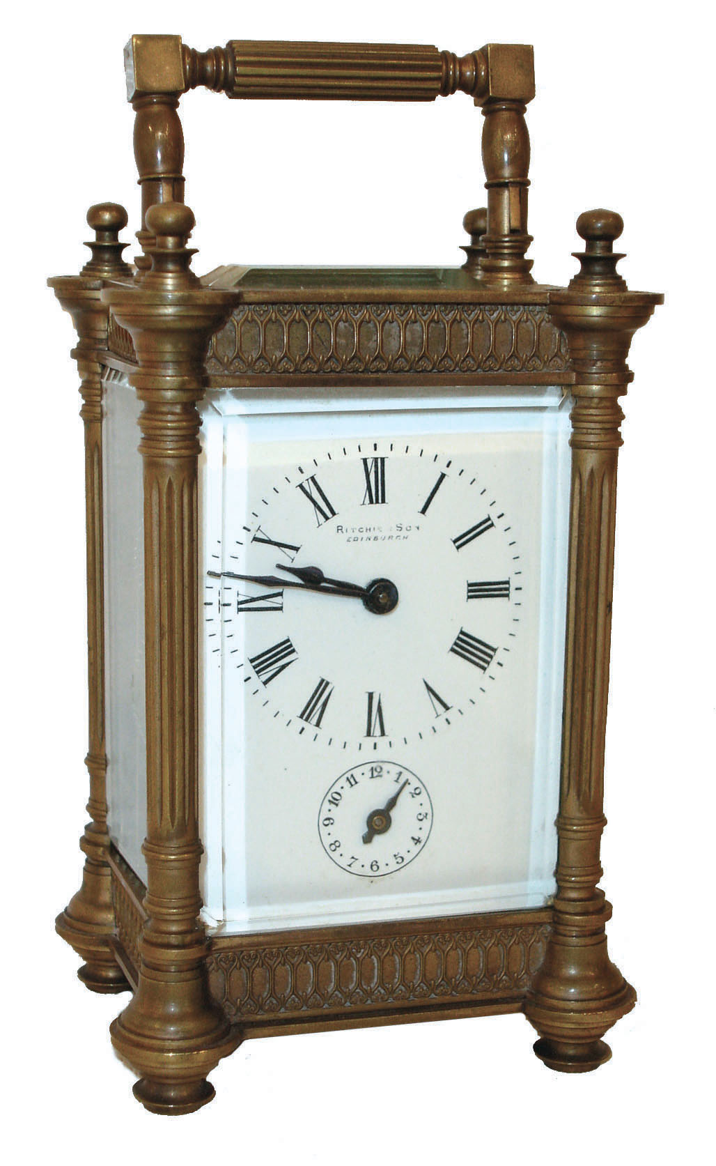 France, for Ritchie & Son, Edinburgh, Scotland, 8 day carriage timepiece with alarm, the bell concealed in the base, gilt brass case with turret corners and turned finials, and with pierced Gothic fret, Arabic numeral white enamel dial, blued steel hands, and with leather covered travel case, c1890 — Antique Clocks Price Guide