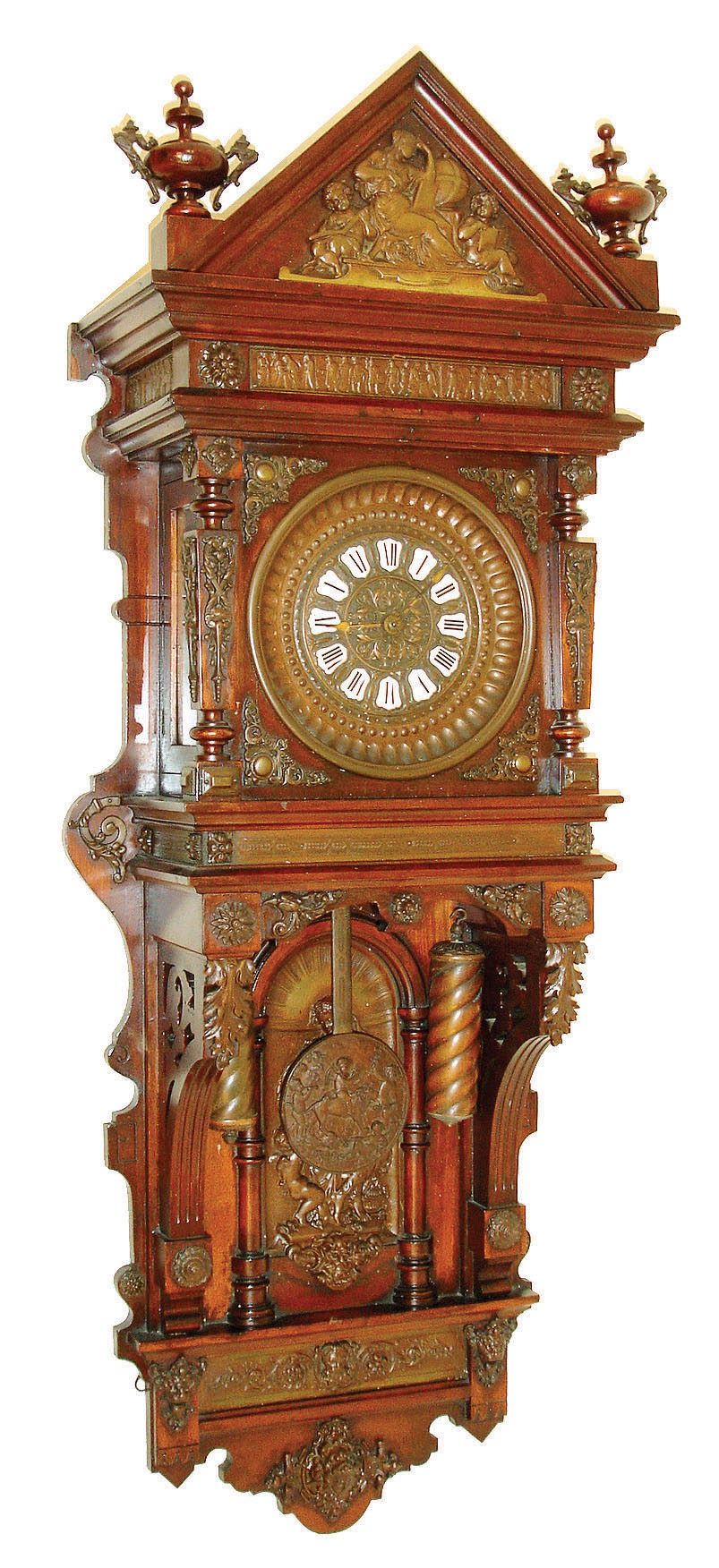 Ansonia Clock Co., New York, N.Y., "Hanging Antique" wall clock, 8 days, time and strike,, brass weight driven movement in a mahogany case with bronzed appliqu s and pressed brass dial with enamel numerals, c1904 — Antique Clocks Price Guide