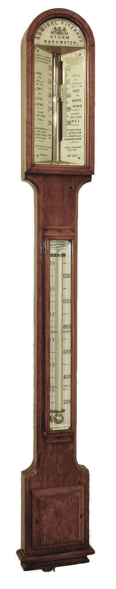 Negretti & Zambra, London, Fitzroy barometer, oak case with dome top, white enamel barometer scales at top, behind bevelled glass, and with thermometer below, also with bevelled glass, the case back with instruction label, c1890 — Antique Clocks Price Guide