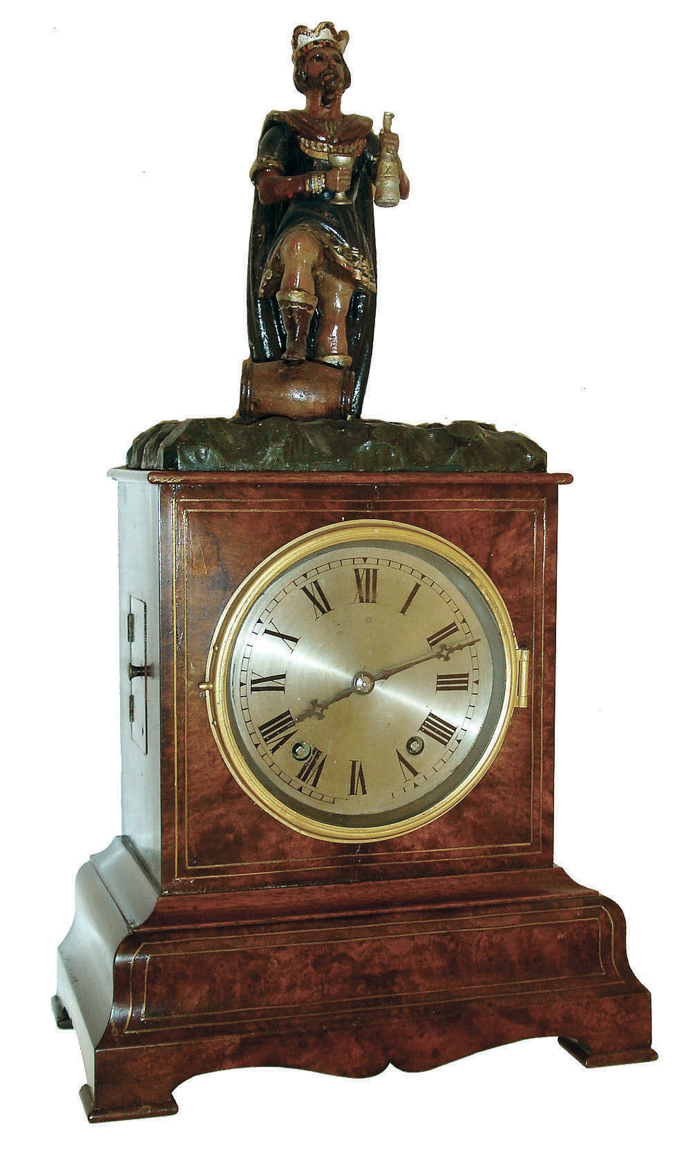 Winterhalder & Hofmeier, Germany, "King Gambrinus" drinker mantel clock, burl walnut case with ogee molded base and brass line inlay, Roman numeral silvered dial, blued steel hands, case top with carved, polychrome painted figure of King Gambrinus, patron saint of beer, the figure with his right foot on a barrel, and when activated, alternately raising a bottle to fill his glass, and then drinking the contents, the action performed twice at each activation, and occurring roughly every 6 minutes, brass 8 day time and swill movement, back of case with small engraved brass plaque marked "H. Rick Clockmaker New York", c1870 — Antique Clocks Price Guide