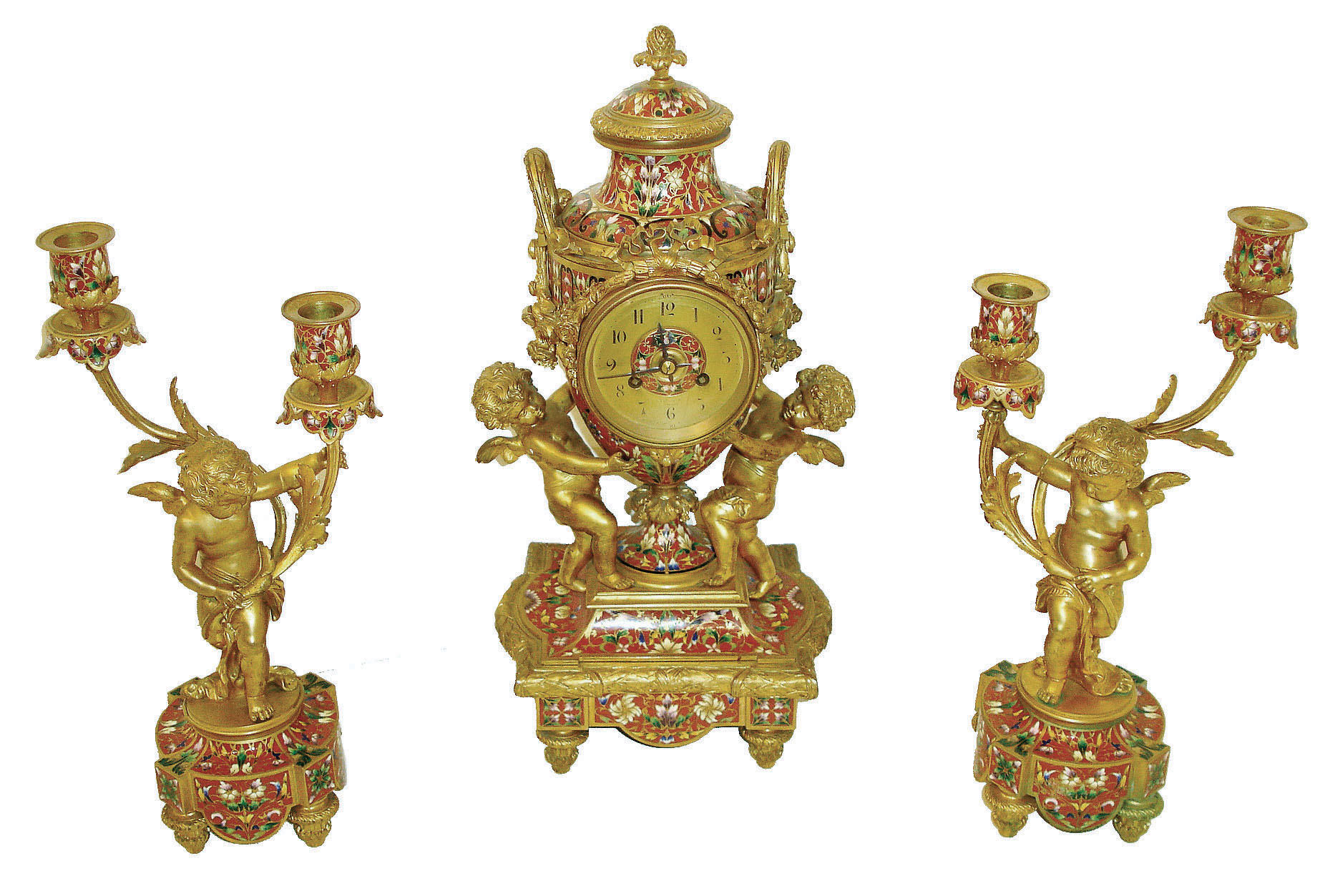 France, for Tiffany & Co., New York, a spectacular 3 piece mantel garniture, the case of urn form supported by two gilt putti, base with foliate decorated toupie feet, and with bound laurel molding, a cast gilt bowknot above dial with suspended floral garlands, and richly ornamented  with very colorful champleve enamel, Arabic numeral gilt dial with champleve center, signed "Tiffany & Co. New York", blued steel hands, brass 8 days, time and strike, movement with lever platform, and also signed "Tiffany & Co. New York", and with a pair of two light candelabra each with a gilt putti, the candle arms with acanthus leaf ornament, and with enamel and feet matching the clock case, c1890 — Antique Clocks Price Guide