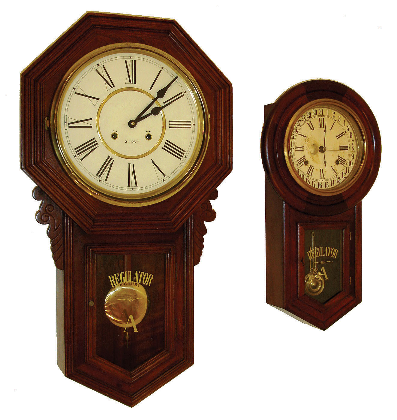 Clocks- 4 (Four): (1) Japanese, 8 days, time and strike, small schoolhouse calendar clock, c. 1910. (2) E. Ingraham & Co., "Boston", 8 days, wall timepiece, c. 1920.  (3) Korean, 31 day, time and strike schoolhouse wall clock, c. 1970.  (4) Seth Thomas Clock Co., "Globe", 8 days, time and strike, wall clock, c. 1900. — Antique Clocks Price Guide