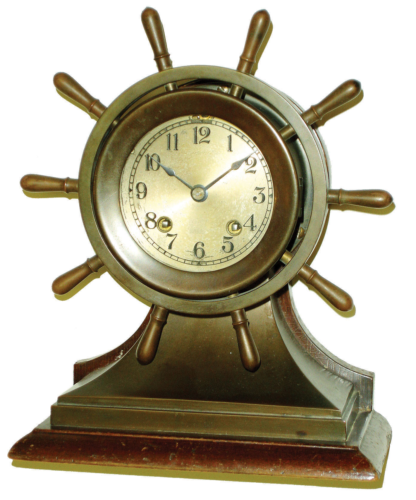 Chelsea Clock Co., Boston, "Mariner" 8 day 3 3/4"-dial time and ship's bells Yacht Wheel bronze marine clock on mahogany stand, #194435, 1929 — Antique Clocks Price Guide