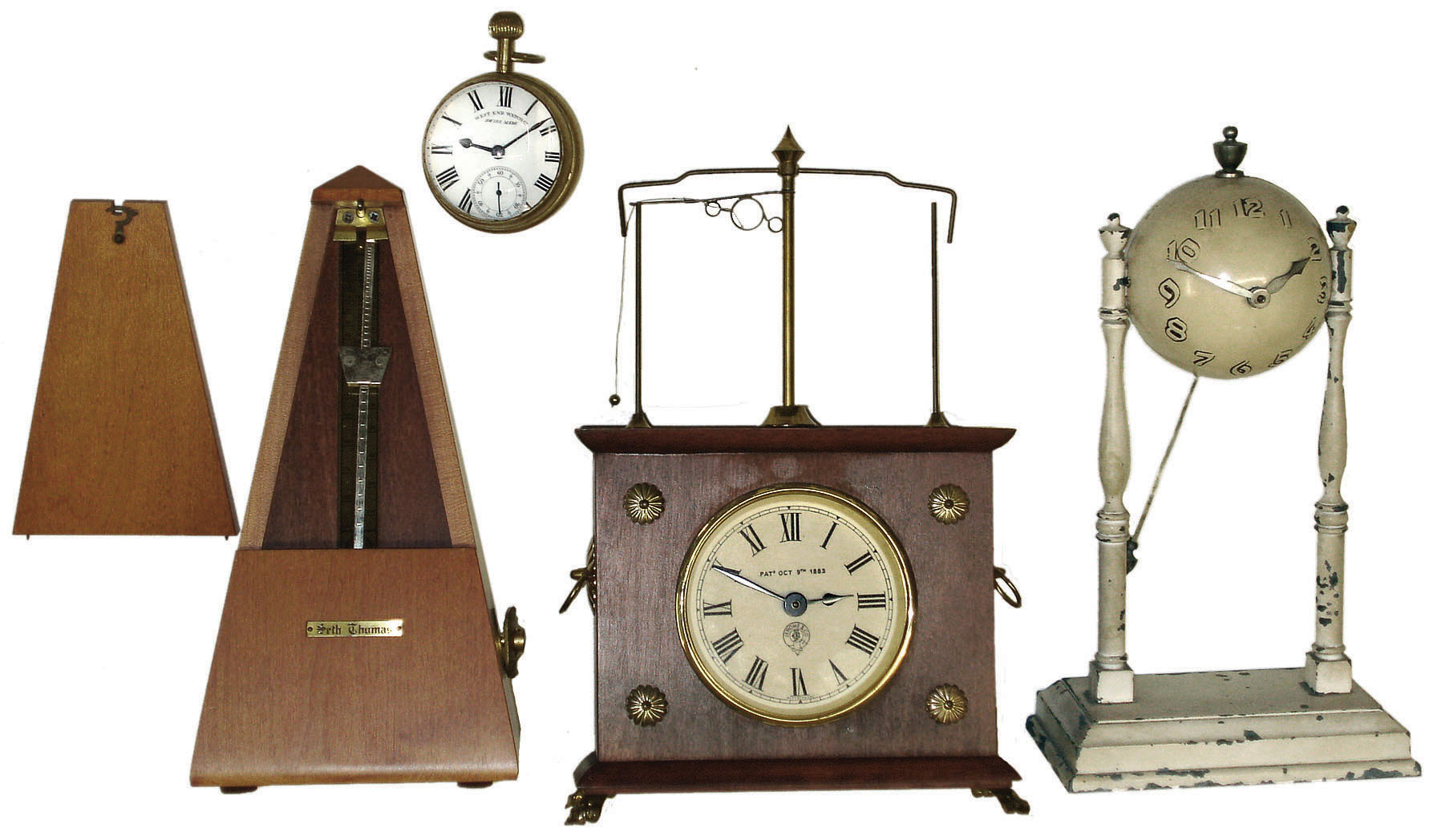 Clocks- 3 (Three) and Seth Thomas metronome: Globe Clock Co. "Worlds Fair" clock, ca 1941; Horolovar reproduction 8 day flying-ball Ignatz; "West End Watch Co." glass ball paperweight clock; 20th century — Antique Clocks Price Guide