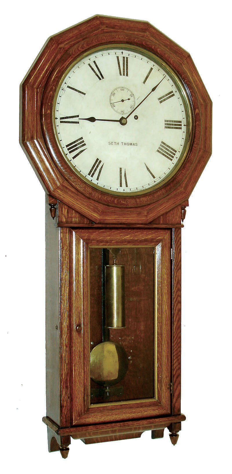 Seth Thomas Clock Co., Thomaston, Conn., "Regulator No. 3" wall clock, 8 days, time only, brass weight driven movement in an oak case with painted metal dial, c1890 — Antique Clocks Price Guide