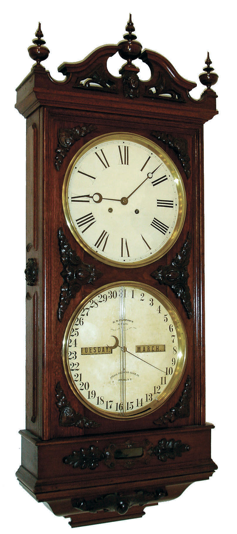 Ithaca Calendar Clock Co., Ithaca, N.Y., "Regulator No. 1" or "Hanging Bank" wall clock, 8 days, time and perpetual calendar, two weight driven movement in a walnut case with composite appliqu s and papered metal dials, c1875 — Antique Clocks Price Guide