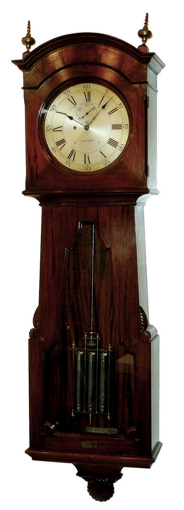 Waltham Clock Co., Waltham, Mass., custom jeweler's regulator wall clock, 8 days, time only, nickel plated weight driven movement, silvered metal dial with subsidiary seconds and mercury compensated pendulum in a mahogany case with elaborate clamshell decoration on base, c1920 — Antique Clocks Price Guide
