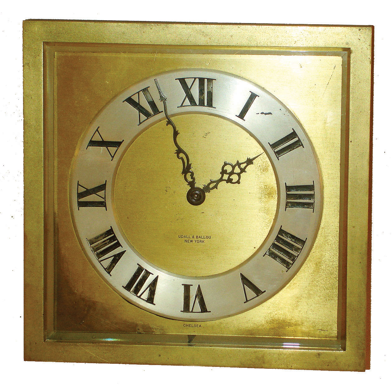Chelsea Clock Co., Boston, for Udall & Ballou, New York, "Raleigh" model 8 day time only, 8" easel desk clock in brass and beveled glass case, #180828, 1927 — Antique Clocks Price Guide