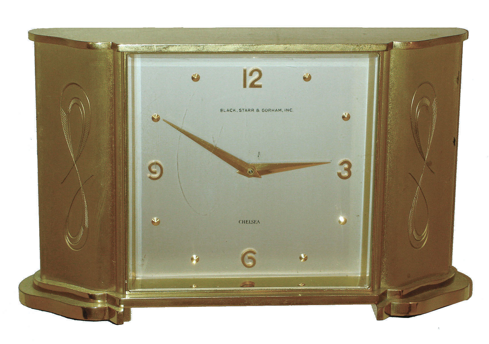 Chelsea Clock Co., Boston, for Black, Starr & Gorham, Inc., "Wisteria" model gold-plated brass 8 day desk clock, c1960. — Antique Clocks Price Guide