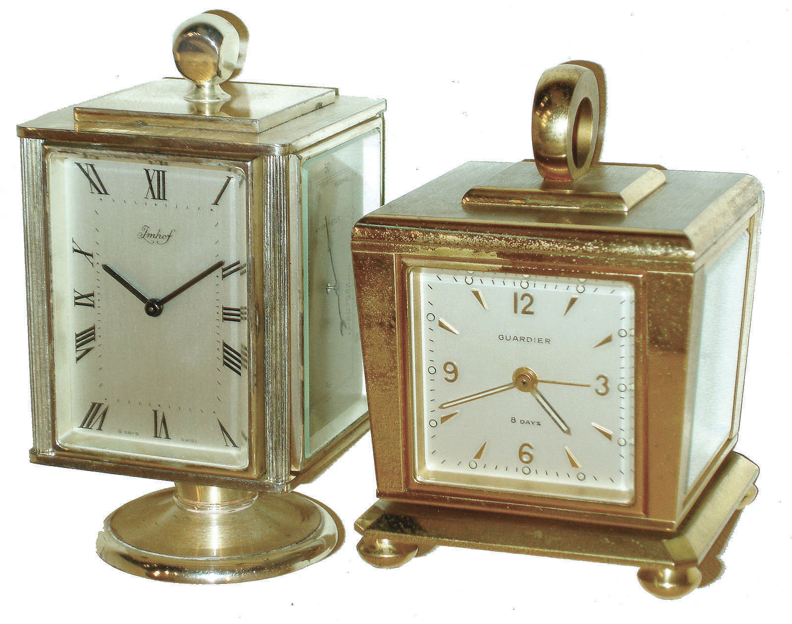 Clocks- 2 (Two): Swiss-made weather stations, both 8 day timepieces in swiveling brass cases with thermometers, barometers, and hygrometers; one Imhof; one Guardier with alarm, c1960 — Antique Clocks Price Guide