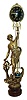 France, figural swinging clock, the male figure standing at the bow of his sailing vessel, with one hand on the wheel, the other held aloft and supporting the clock, mounted to a turned wooden base, now with a later 20th century reproduction 8 day time only, ball style swinging clock