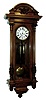 Vienna regulator, walnut and walnut veneer case with carved ornament, removable crest also with carving, door with turned and carved columns, Roman numeral white enamel dial with pierced blued steel hands, brass 8 days, time and strike, movement, 5 spoke pulleys, brass pendulum with ebonized wooden rod, brass weights, c1890