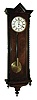 Clocks- 2 (Two) Austria, Vienna regulators: a rosewood grained and veneered serpentine front case with molded cornice and bottom bracket, Roman numeral white enamel dial, pierced steel hands, brass 8 day 3 train grand sonnerie striking movement, polished brass pendulum and weights, c1860 and a walnut veneered case with ebonized moldings, door with twist turned split columns, Roman numeral white enamel dial, blued steel hands, brass 8 day time only, movement, polished brass pendulum and weight, c1870