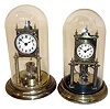 Clocks- 2 (Two) German made 400 day disk pendulum unsigned "anniversary" with glass domes, one with compensating pendulum, c1910