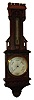 Negretti and Zambra, London, aneroid barometer and thermometer, the ornate carved oak case in the Gothic style, thermometer with silvered scale, barometer with engraved, silvered dial with blued steel indicator and gilt set hand, and signed Negretti & Zambra, London, No. 4190, c1900
