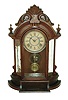 William L. Gilbert Clock Co., Winsted, Conn., "Occidental" 8 days, time and strike, walnut shelf clock, c1891.