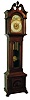 Seth Thomas Clock Co., Thomaston, Conn., tall clock, 8 days, weight driven time & quarter chiming on four bells and striking on cathedral gong, case with beveled door glass and turned full columns on hood. Brass dial with applied cast brass spandrels and engraved center, silvered chapter with applied brass numerals and moon phase, c1900