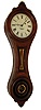 E. Howard & Co., Boston, Mass., "No. 10 Regulator" figure eight wall clock, 8 days, time only, weight driven movement in a walnut case with painted metal dial and reverse painted tablets, c1900