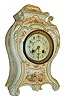 WITHDRAWN-NOT IN AUCTION: France, mantel clock, decorative ceramic case in the rococo style, with aquamarine glaze and gilt ornaments, the front decorated with two figures in antique dress reclining in a landscape, Arabic numeral white enamel dial with polychrome floral garlands, gilt bezel with convex beveled glass, gilt hands, 8 days, time and strike, pendule a Paris movement, signed Japy Freres and also A1, pierced brass rear cover with fabric lining, c1910