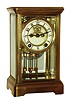 New Haven Clock Co., New Haven, Conn., "Thespia" 8 days, time and strike, brass and beveled glass mantel clock with visible escapement, c1911