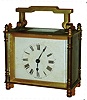 French 8 day time-only "oblong" style rectangular brass and beveled glass carriage clock with leather carrying case, 1930 engraved inscription