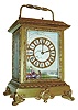 French hour repeating carriage clock with 3 polychrome enamel panels, gilt case on scrolled feet with foliate ornament, ornate base molding and glass frames, case with beveled glasses, Roman numeral dial with image of children conversing in a meadow, blued steel hands, the left panel of a woman in fancy Victorian dress and on ice skates, the right panel with a well dressed Victorian woman walking in a field, all panels signed at lower right, 8 days, time and strike, movement with lever platform, repeating the hour on demand, c1880