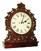 English, late Victorian carved mahogany case twin fusee gong strike wall clock, with later base to make it a mantel clock, c1890
