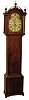 Asaph Whitcomb, Concord, Mass., tall clock, 8 days, time and strike, weight driven brass movement in a hard wood case with painted iron dial and date calendar, c1817